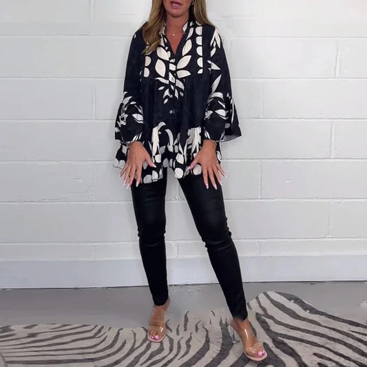 Ingalisa – Elegant randig blus med tidlös charm