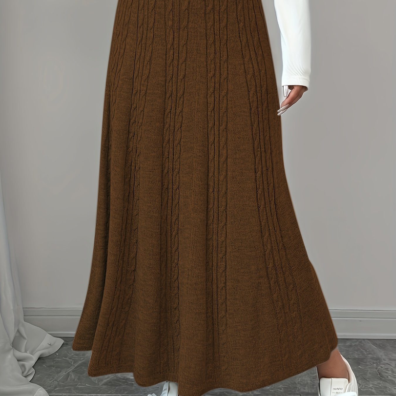 Aina – Klänningen som sveper med elegans